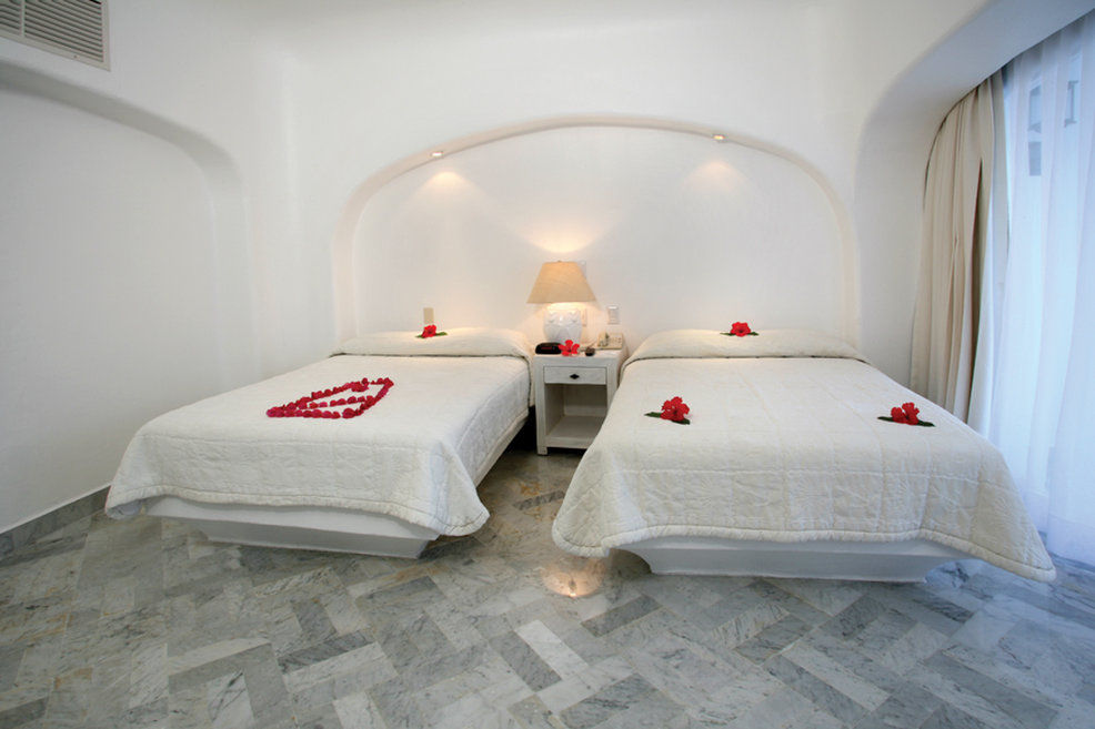 Las Hadas By Brisas Manzanillo Esterno foto A room at the hotel