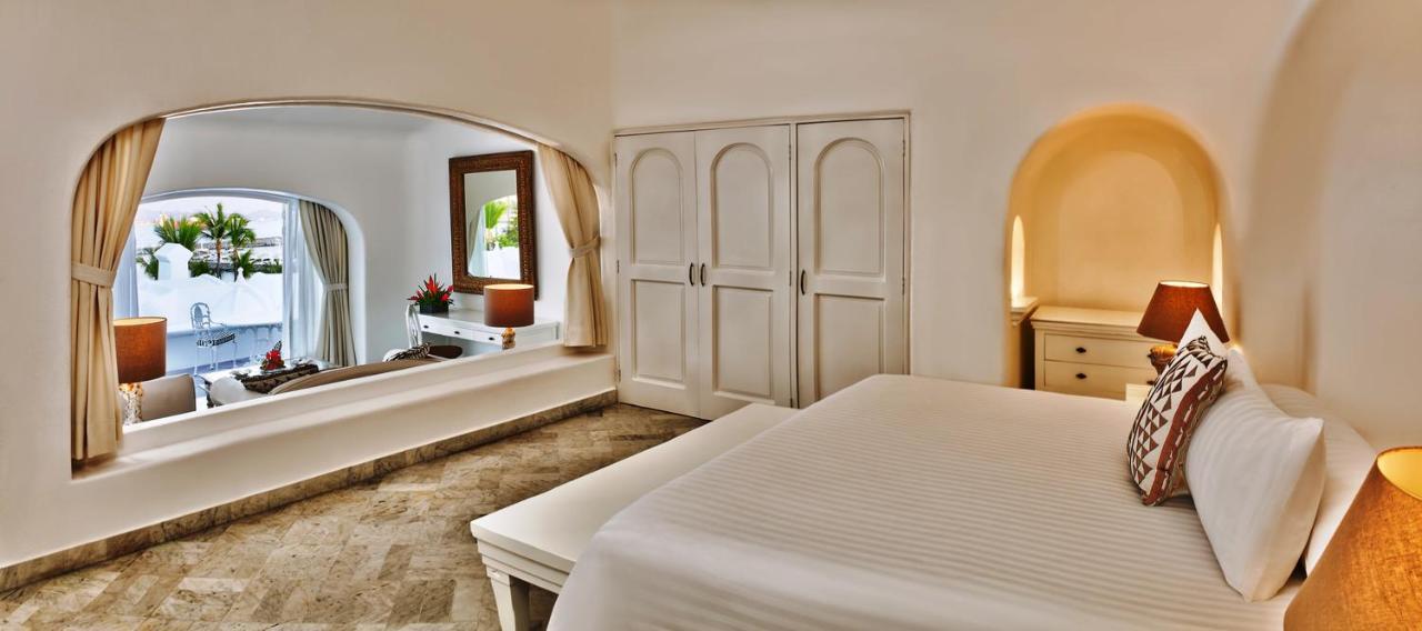Las Hadas By Brisas Manzanillo Esterno foto A bedroom at the resort