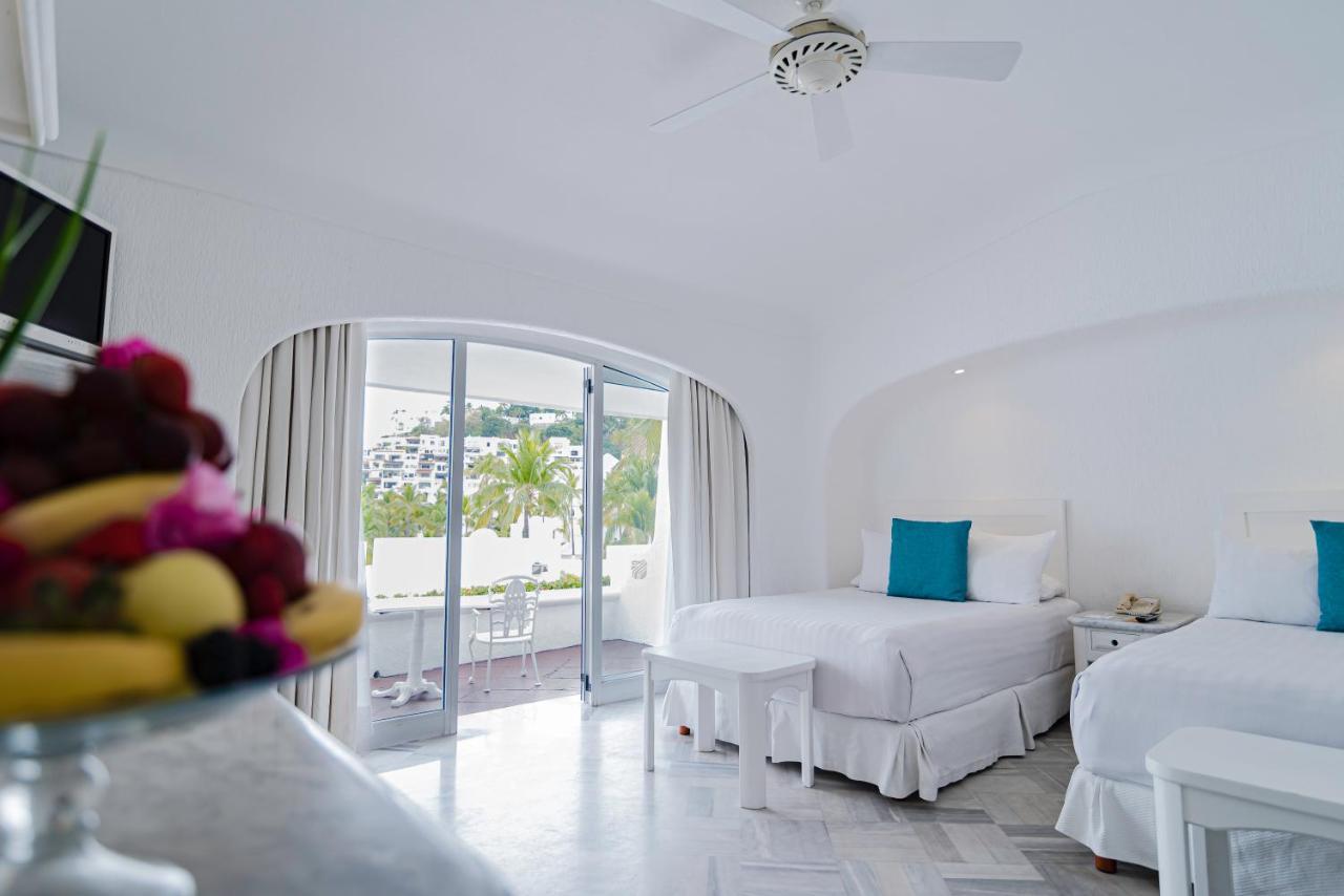 Las Hadas By Brisas Manzanillo Esterno foto A room at the hotel